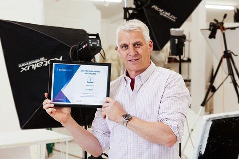 William Lack with certificate landscape